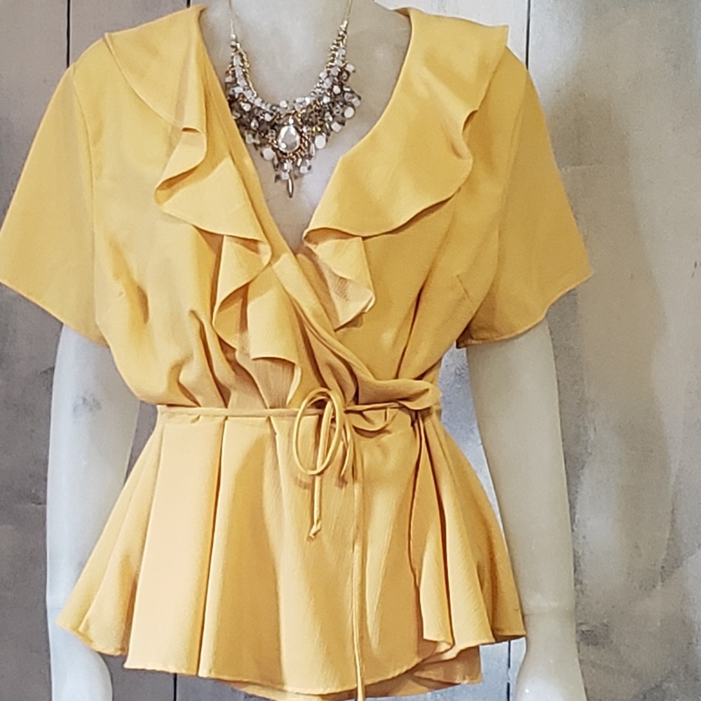 Bright sunshine yellow wraparound blouse with ruff